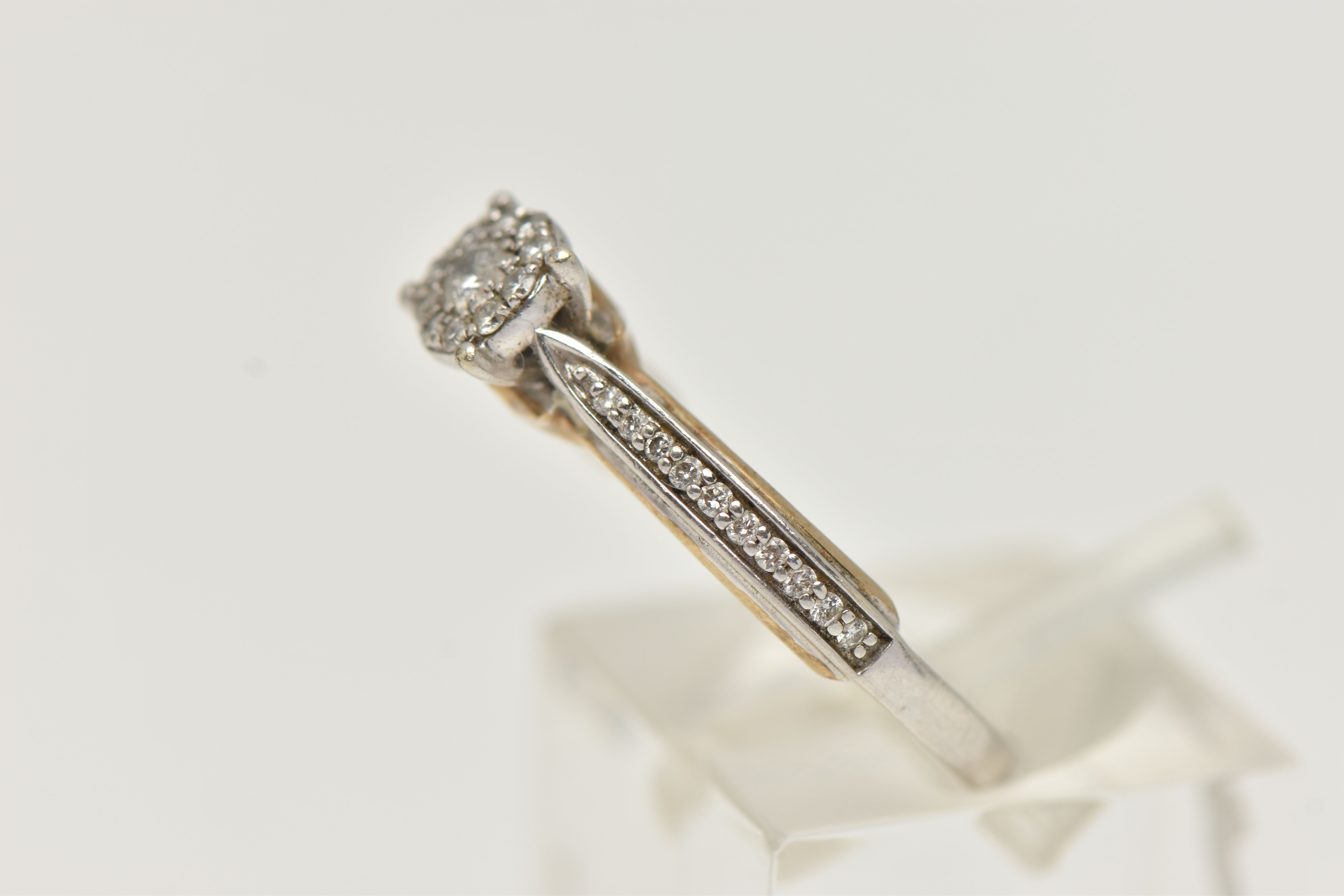 A 9CT WHITE GOLD DIAMOND RING, designed as a central brilliant cut diamond within a brilliant cut - Image 2 of 4