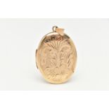 A 9CT GOLD OVAL LOCKET, floral pattern, hallmarked 9ct Birmingham, fitted with a tapered bail,