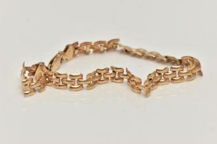 A 9CT GOLD ARTICULATED BRACELET, fitted with a lobster clasp, hallmarked 9ct Birmingham, length