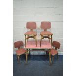 A MID-CENTURY FORMICA TOP TABLE, with a double sided drawer, raised on cylindrical tapered legs,