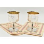 A PAIR OF ELIZABETH II SILVER GOBLETS, polished cups engraved with a family crest inscribed 'A.D.