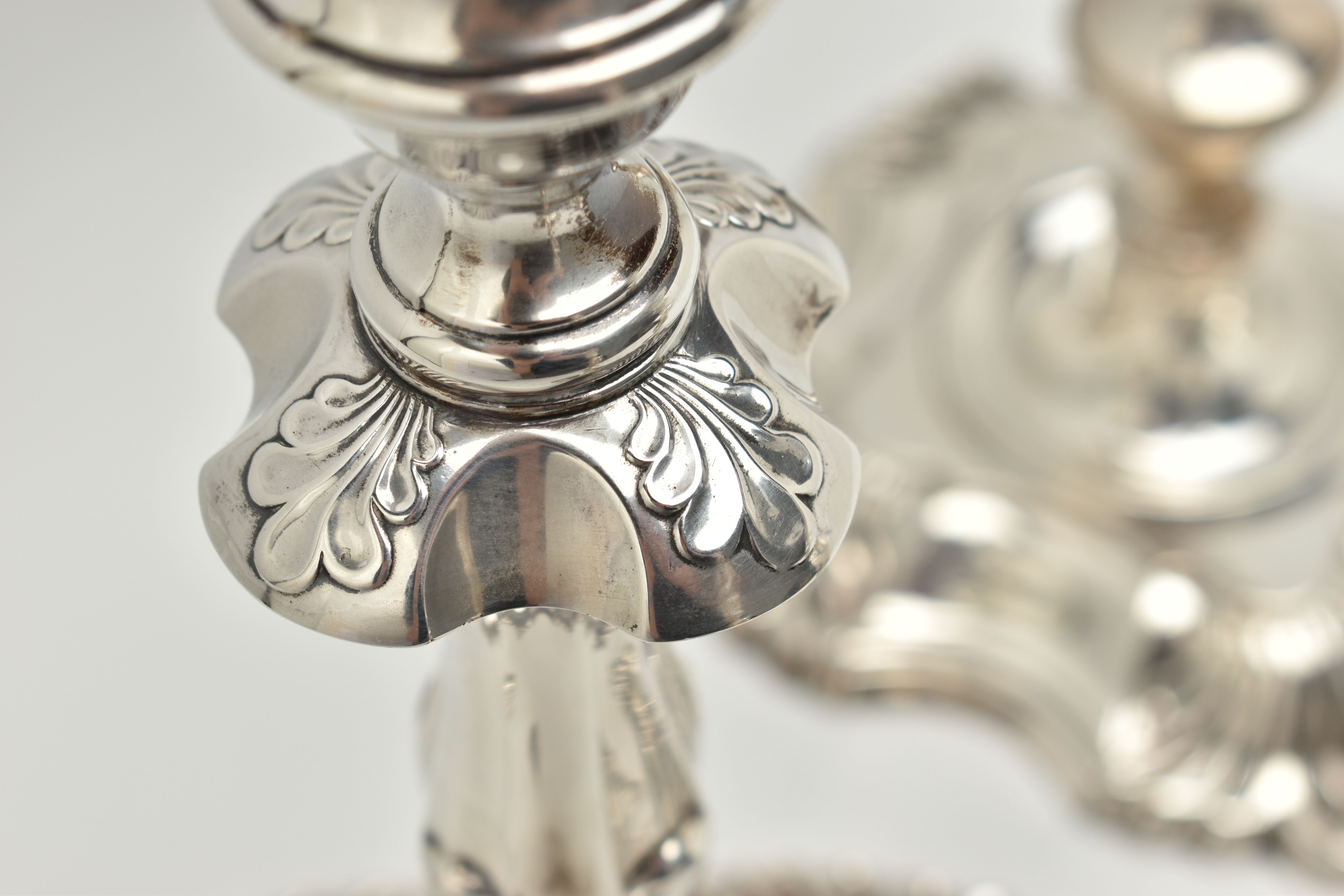 A GEORGE V SILVER SET OF FOUR CANDLESTICKS IN GEORGE II STYLE, with removable shaped square drip - Image 10 of 10