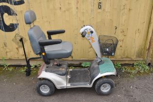 A STATUS XL6 MOBILITY SCOOTER with one key and charger (PAT pass and working