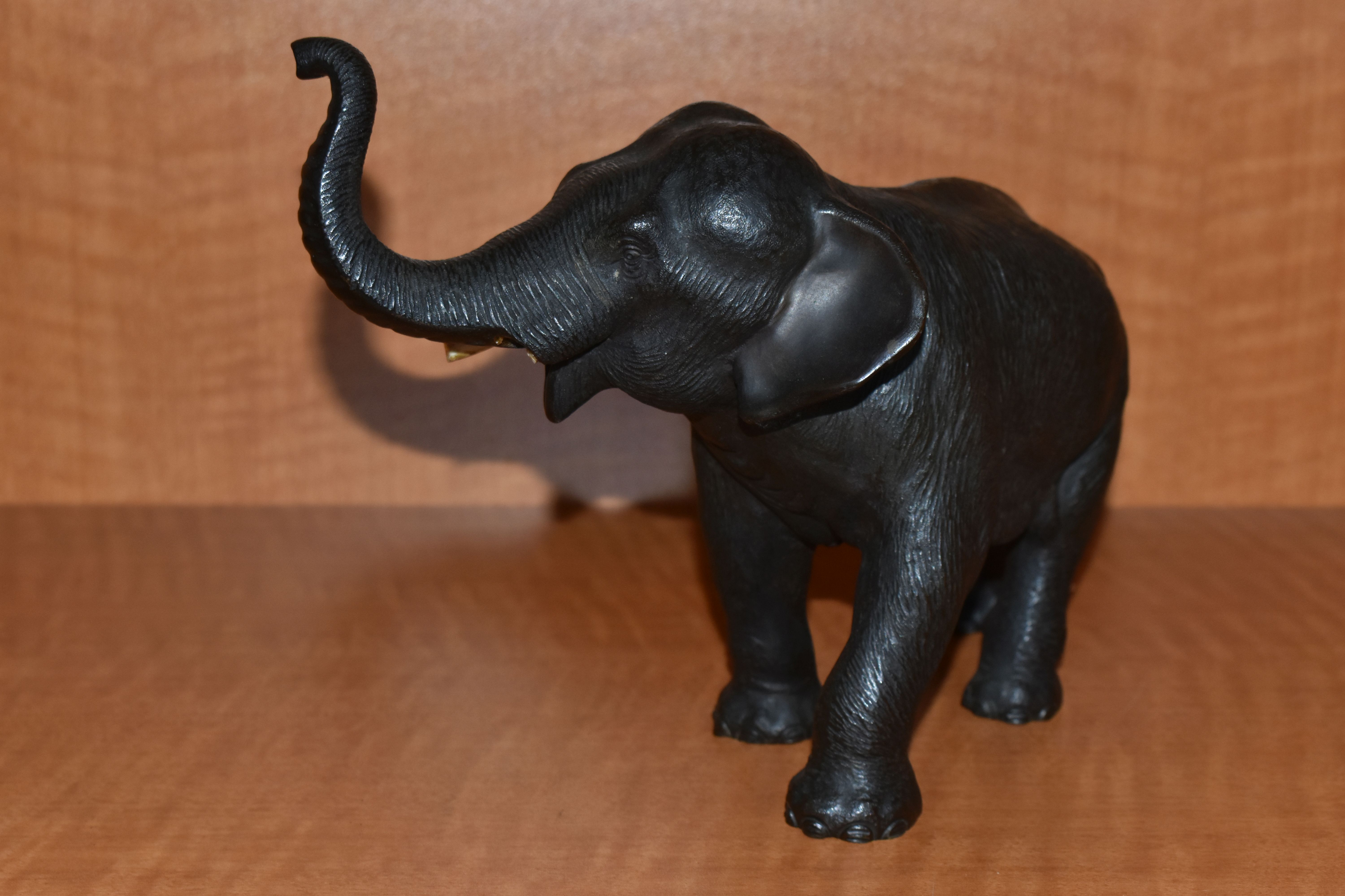 A LATE 19TH CENTURY MEIJI PERIOD JAPANESE BRONZE FIGURE OF AN ELEPHANT WITH TRUNK RAISED, remnants - Image 3 of 5