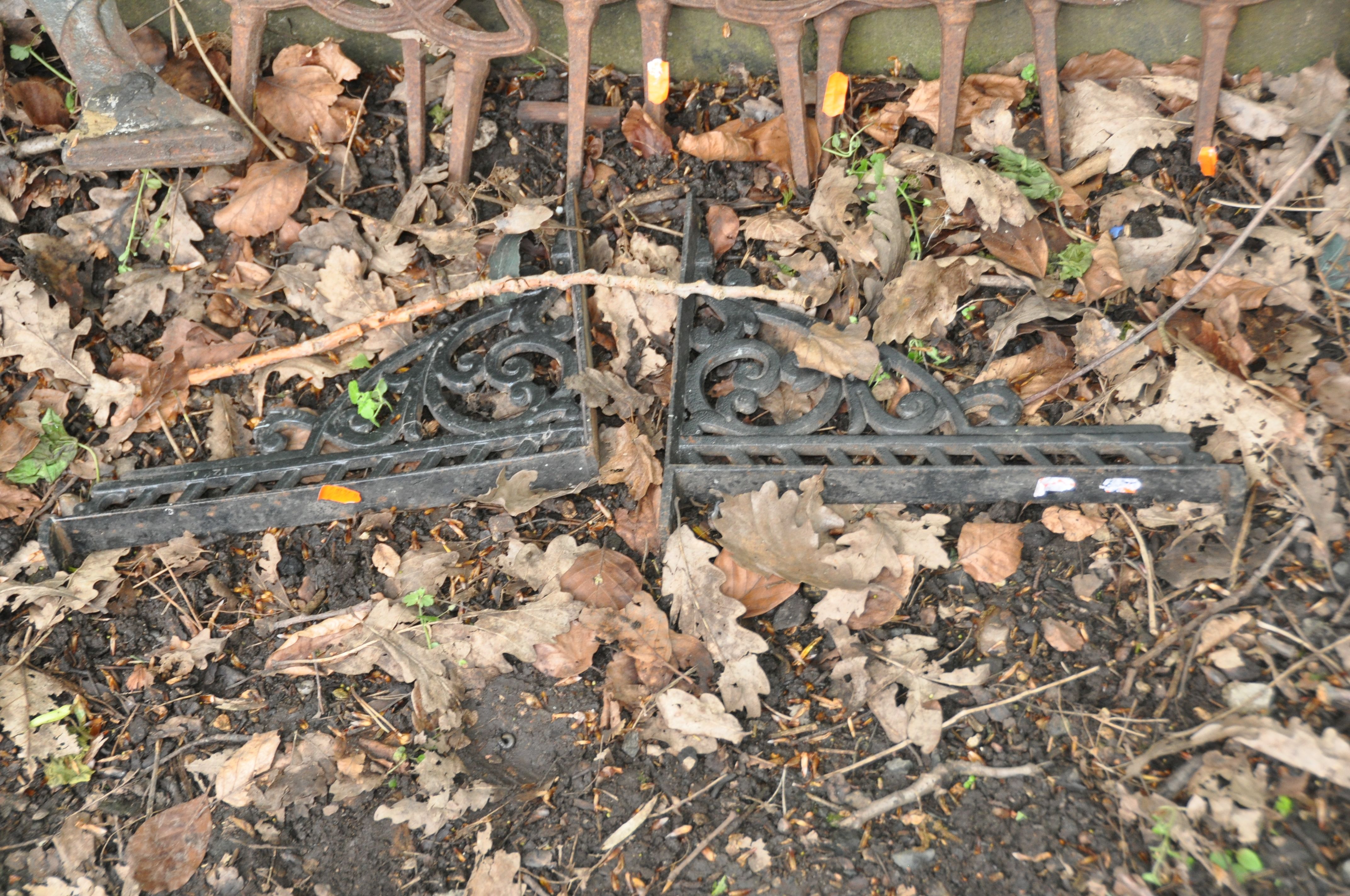 A COLLECTION OF CAST IRON GARDEN ITEMS including seven Victorian lawn edgers, a modern table top, - Image 4 of 6