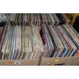 FOUR BOXES OF VINYL LPS to include a variety of genres such as easy listening, German folk and other