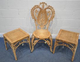 A WICKER CHAIR, the back rest in the form of a heart, with spiral decorations, raised on shaped