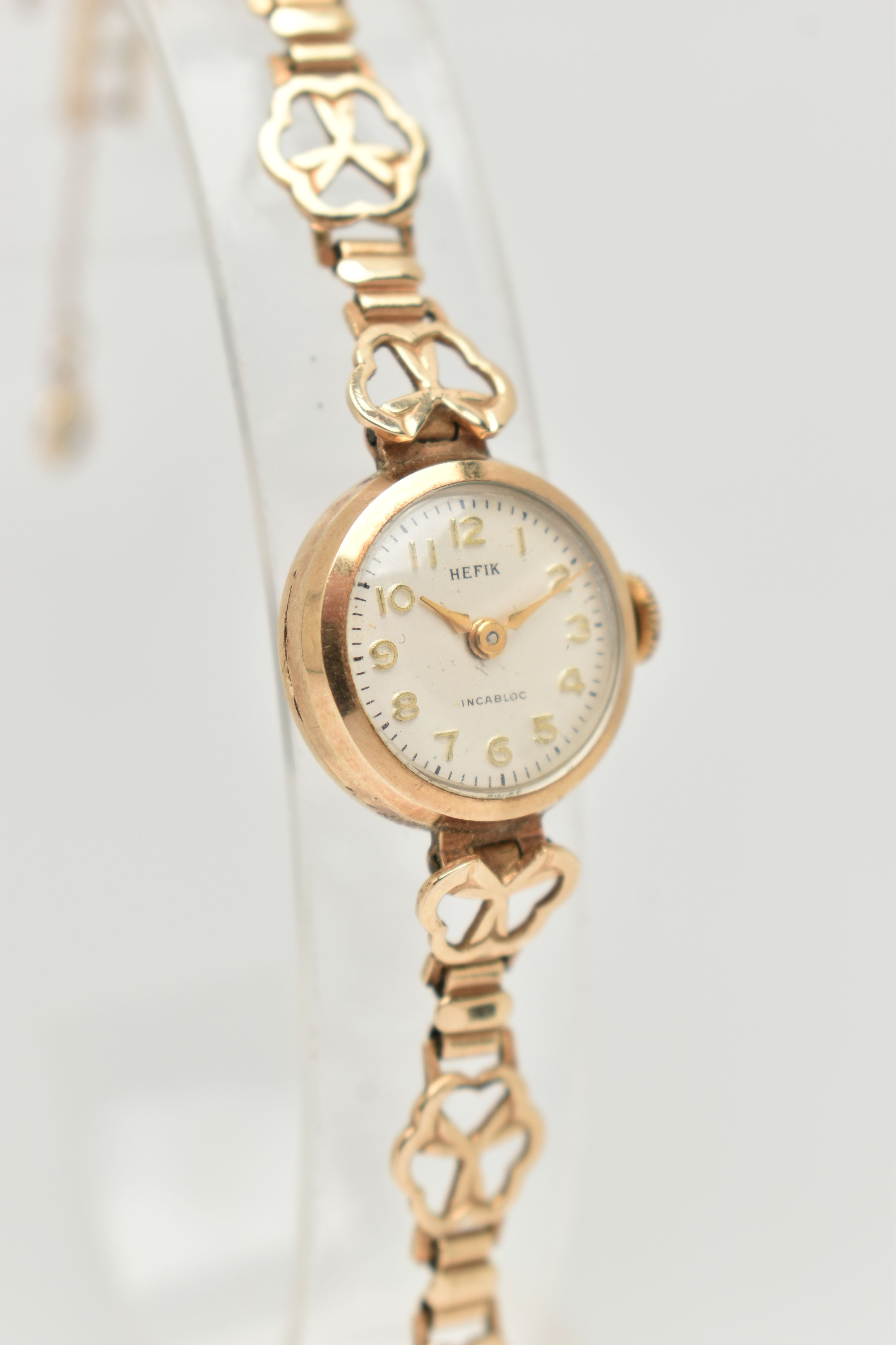A LADIES 9CT GOLD WRISTWATCH, manual wind, round silver dial signed 'Hefix', Arabic numerals, gold - Image 3 of 6