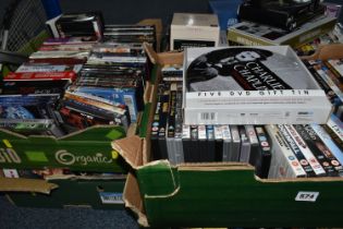 SIX BOXES OF PRE-RECORDED DVDS, mostly cinematic films to include classic titles and more modern