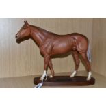A BESWICK CONNOISSEUR MODEL OF 'GRUNDY' RACEHORSE OF THE YEAR 1975, matt glaze, model number 2558,