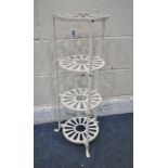 A WHITE PAINTED WROUGHT IRON FOUR TIER PAN STAND, height 77cm (condition report: general signs of