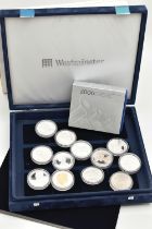 A WESTMINSTER BOX OF QUEEN ELIZABETH CROWN COINS, 8x 2006 Her 80 Glourious Years coins, to Include a