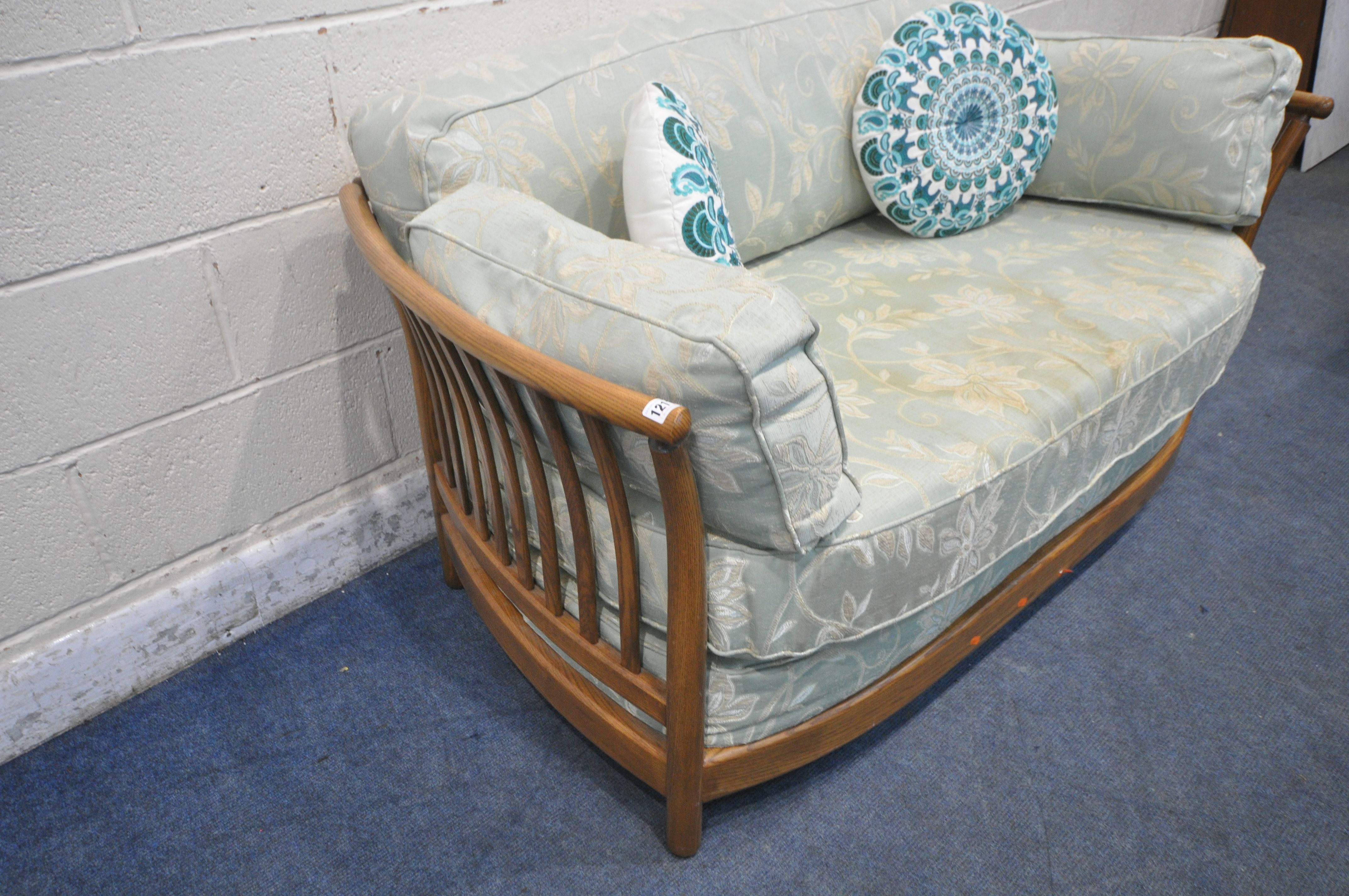 A LATE 20TH CENTURY ERCOL ASH TWO SEATER SOFA, with mint green and foliate upholstery, length - Image 2 of 4
