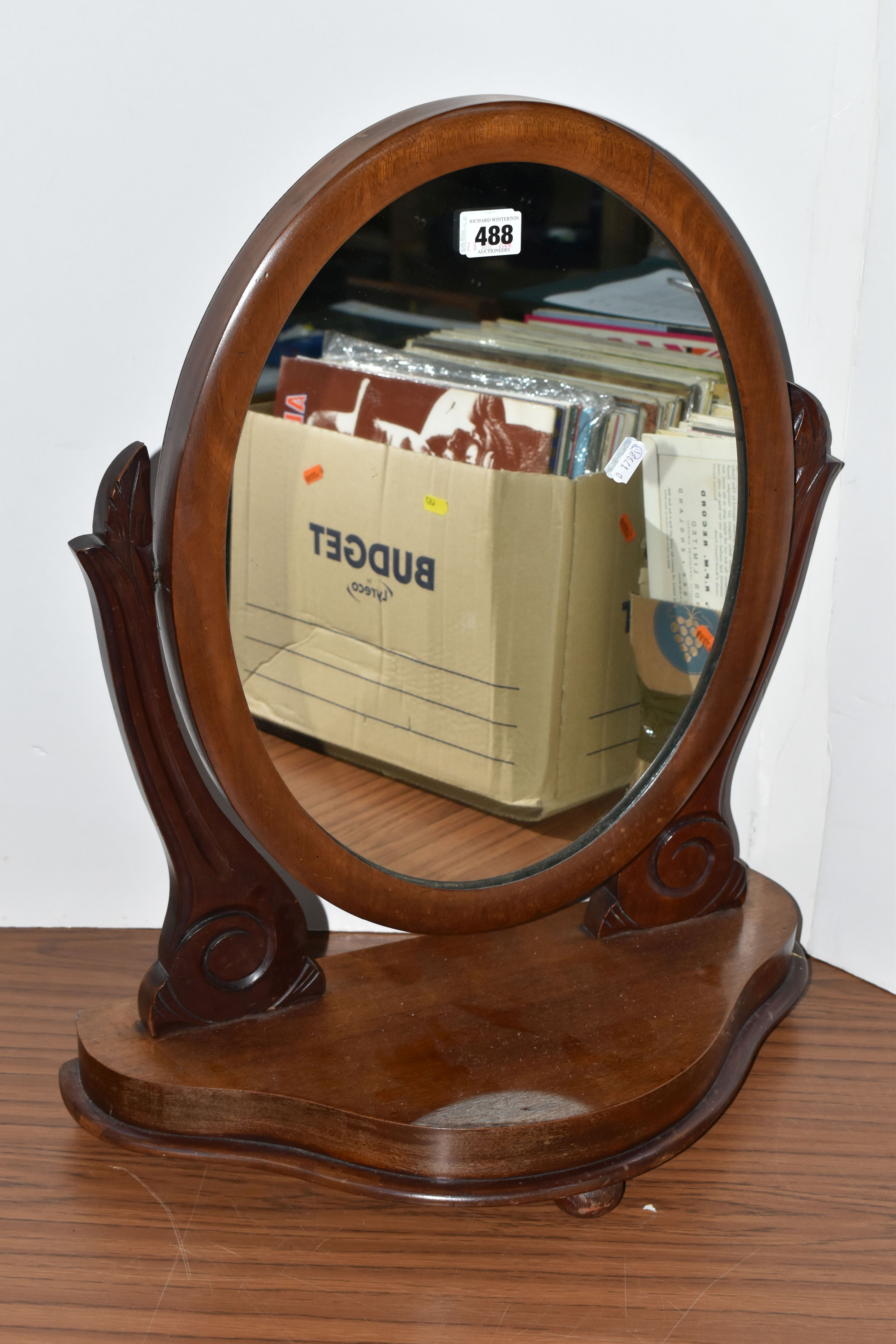 A DRESSING TABLE 'OVAL' MIRROR, 58cm height x 46cm height, original manufacturers marks on brass