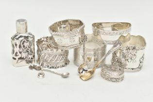 A SELECTION OF SILVER ITEMS, to include five silver napkin rings, assorted with different designs,