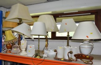 A VARIETY OF LAMPS AND LAMPSHADES to include table lamps with wood, brass, plastic, onyx,