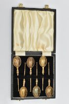 A CASED SET OF ELIZABETH II SILVER GILT REPLICA CORONATION ANOINTING TEASPOONS, a set of six