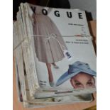 TWELVE COPIES OF EARLY 1950'S VOGUE MAGAZINE, comprising 1952 - April & August, 1953 - January,