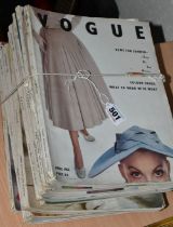 TWELVE COPIES OF EARLY 1950'S VOGUE MAGAZINE, comprising 1952 - April & August, 1953 - January,