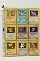 COMPLETE POKEMON FOSSIL SET, condition ranges from moderately played to excellent