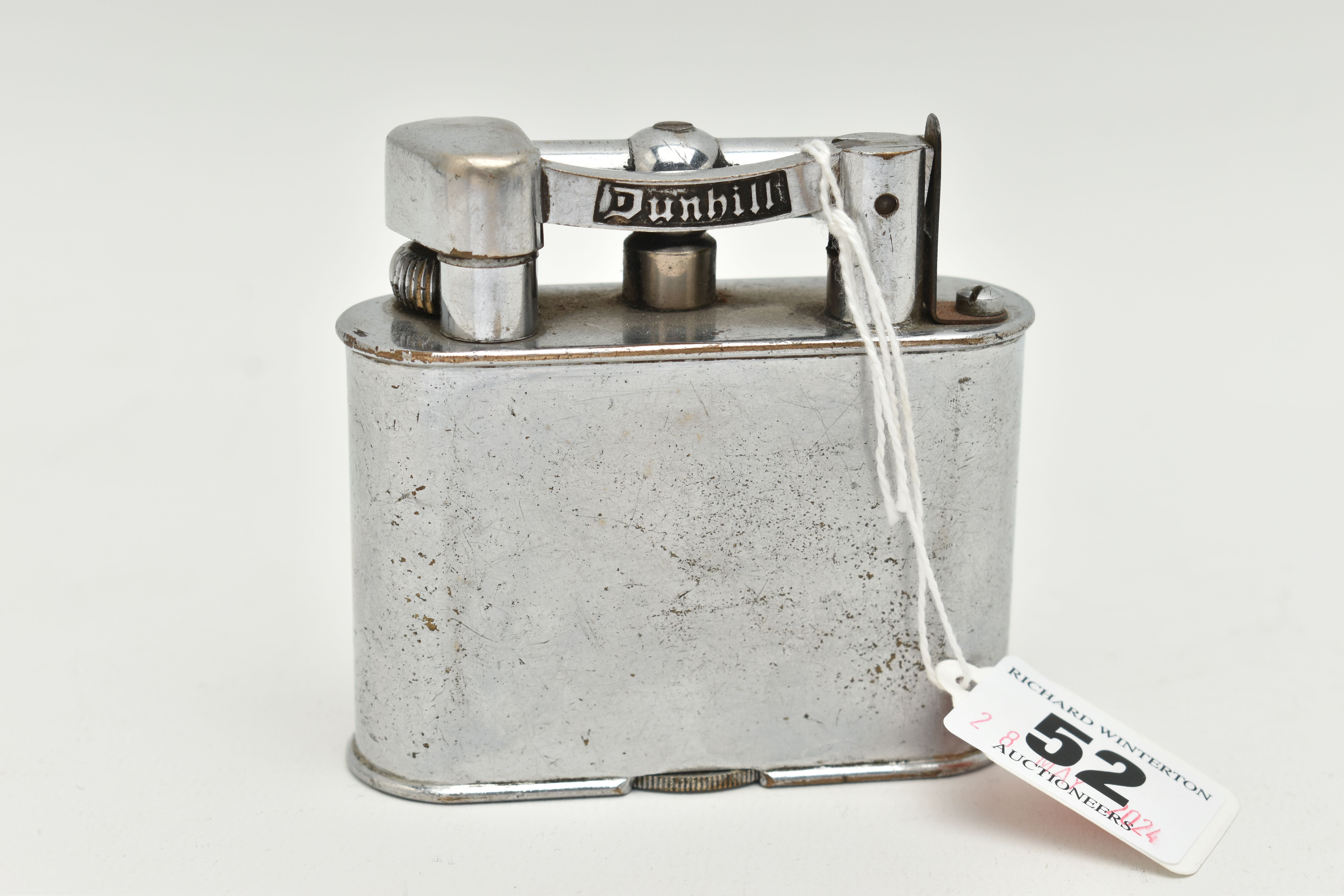 A LARGE DUNHILL LIGHTER, base metal lighter, signed to the base 'Dunhill Lighter', stamped patent