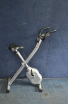 AN UNBRANDED EXERCISE BIKE (display untested)