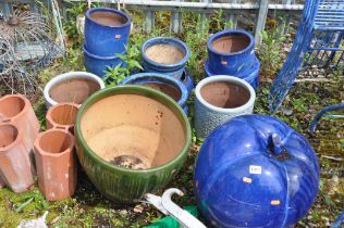 TEN GLAZED GARDEN PLANTERS and four terracotta items largest 'apple' being 40 cm in diameter