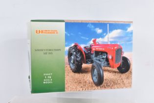 A BOXED UNIVERSAL HOBBIES MASSEY FERGUSSON MF 35X 1:16 SCALE MODEL, numbered UH2692, red body with