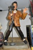 A LARGE COMPOSITE FLOOR STANDING FIGURE OF AN ELVIS STYLE FIGURE, A.L.D designed by Jacobs, height