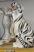 A LARGE SEATED PORCELAIN WHITE TIGER AND TWO PORCELAIN SIDE TABLES, comprising a seated roaring