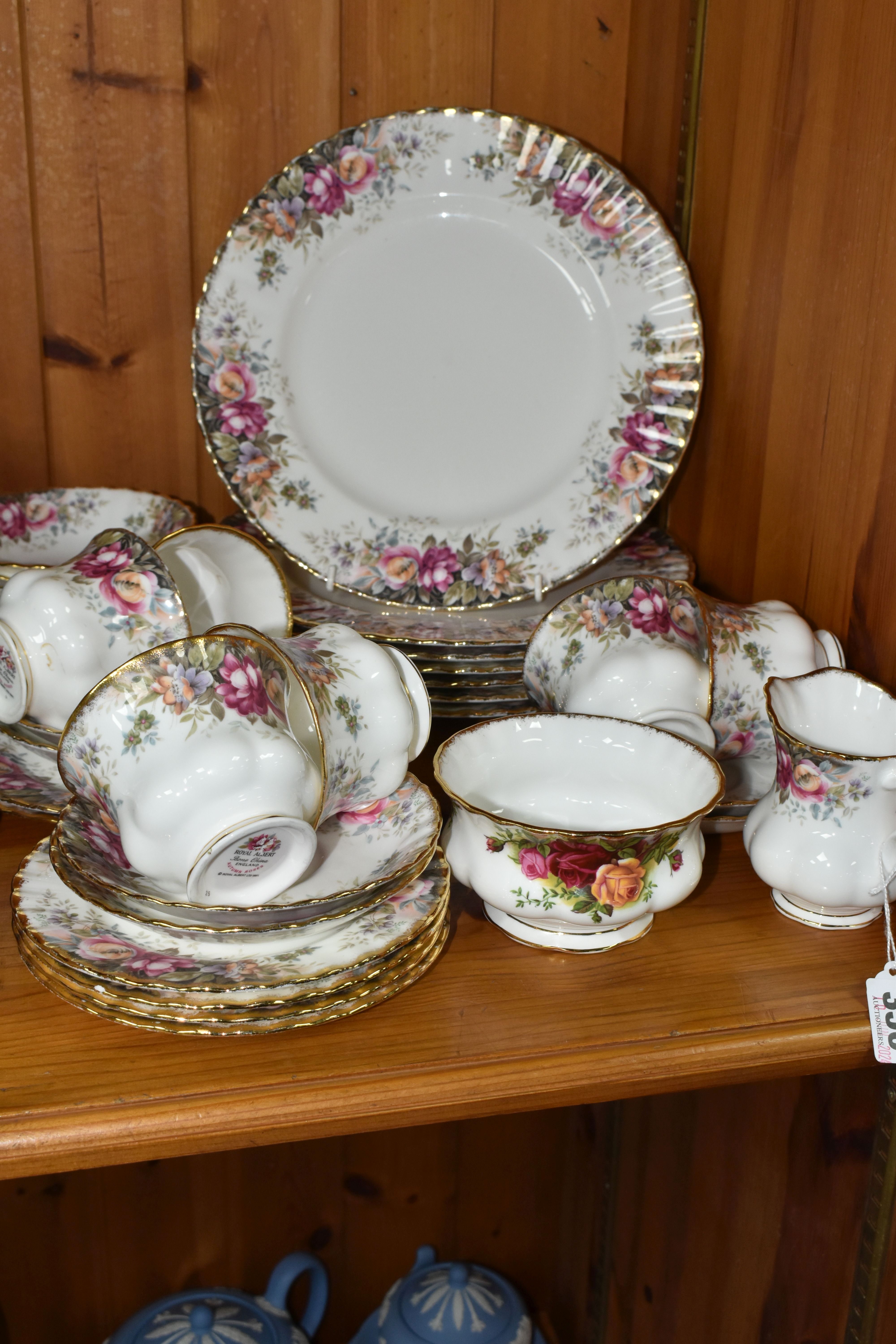 A GROUP OF ROYAL ALBERT 'AUTUMN ROSES' PATTERN DINNERWARE, comprising seven dinner plates, six