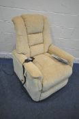 A CARECO YELLOW RISE AND RECLINE ARMCHAIR, width 78cm x depth 90cm x height 104cm (condition report: