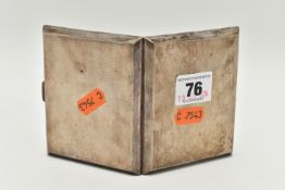 A SILVER CIGARETTE CASE, of a rectangular form, engine turned pattern, push button clasp, gilt