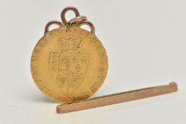 A GEORGE III 1791 GOLD GUINEA WITH GOLD MOUNT, approximate weight 9.02 grams, together with a 9ct