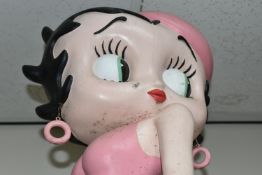 A BETTY BOOP STATUE WITH PUDGEY THE PUP, featuring the main character in a pink dress and pink