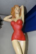 A DECORATIVE 1950's STYLE 'PIN-UP' GIRL RESIN STATUE, approximately 90cm in height, (1) (crack on