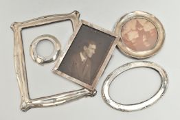 SILVER PHOTO FRAMES, to include a circular photo frame hallmarked Birmingham, with photo, a