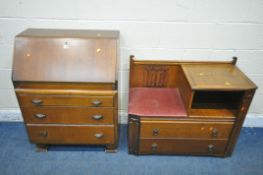 AN EARLY 20TH CENTURY OAK BUREAU, the fall front door enclosing a fitted interior, above three