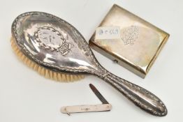 THREE ITEMS OF SILVERWARE, to include a 1920's silver mounted hairbrush, hallmark for Birmingham