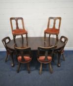 AN EARLY 20TH CENTURY MAHOGANY OVAL WIND OUT DINING TABLE, raised on cabriole legs, with two