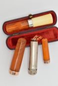 THREE LATE VICTORIAN AND EDWARDIAN AMBER CHEROOT HOLDERS, two with 9ct collars, one with central