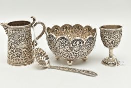 OOMERSI MAWJI, FOUR PIECES OF INDIAN KUTCH SILVER BEARING THE MARK O.M BHUJ, comprising a conical