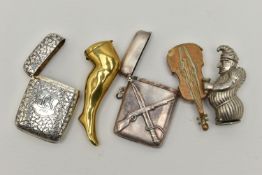 FIVE VESTA CASES, the first a silver rounded rectangular vesta with foliate pattern and engraved