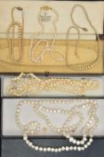 A SELECTION OF CULTURED AND IMITATION PEARL NECKLACES, to include two graduated imitation pearl