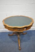 A REPRODUCTION MAHOGANY TRIPOD TABLE, with a wavy top, green leather inlay, and single drawer,