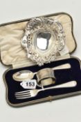 A CASED EARLY 20TH CENTURY SILVER CHRISTENING SET AND A LATE VICTORIAN SILVER BON BON DISH, the