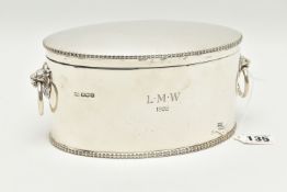 A GEORGE V SILVER BISCUIT/CRACKER BARREL OF OVAL FORM WITH LION MASK RING HANDLES, cast rims, the