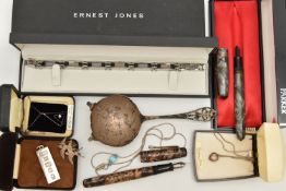 AN ASSORTMENT OF ITEMS, to include a silver strainer, hallmarked 'Viner's Ltd' Sheffield 1938,