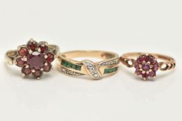 THREE 9CT GOLD GEM SET RINGS, the first designed as channel set square cut emeralds with crossover