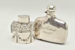A LATE VICTORIAN SILVER TEA CADDY OF SHAPED OVAL FORM AND A GEORGE V SILVER HIP FLASK, the tea caddy